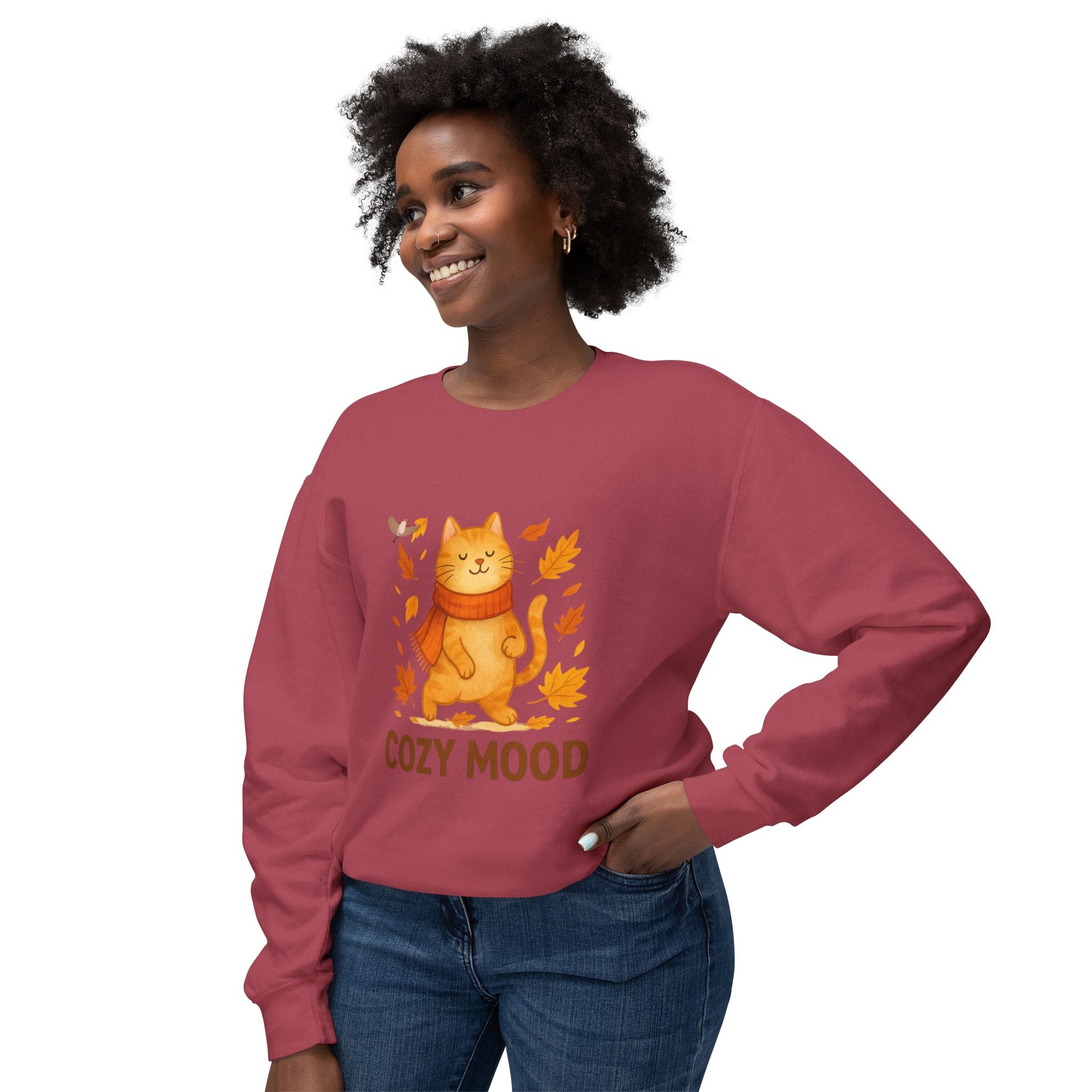 Woman wearing a red sweatshirt with a cat graphic and 'Cozy Mood' text on a white background