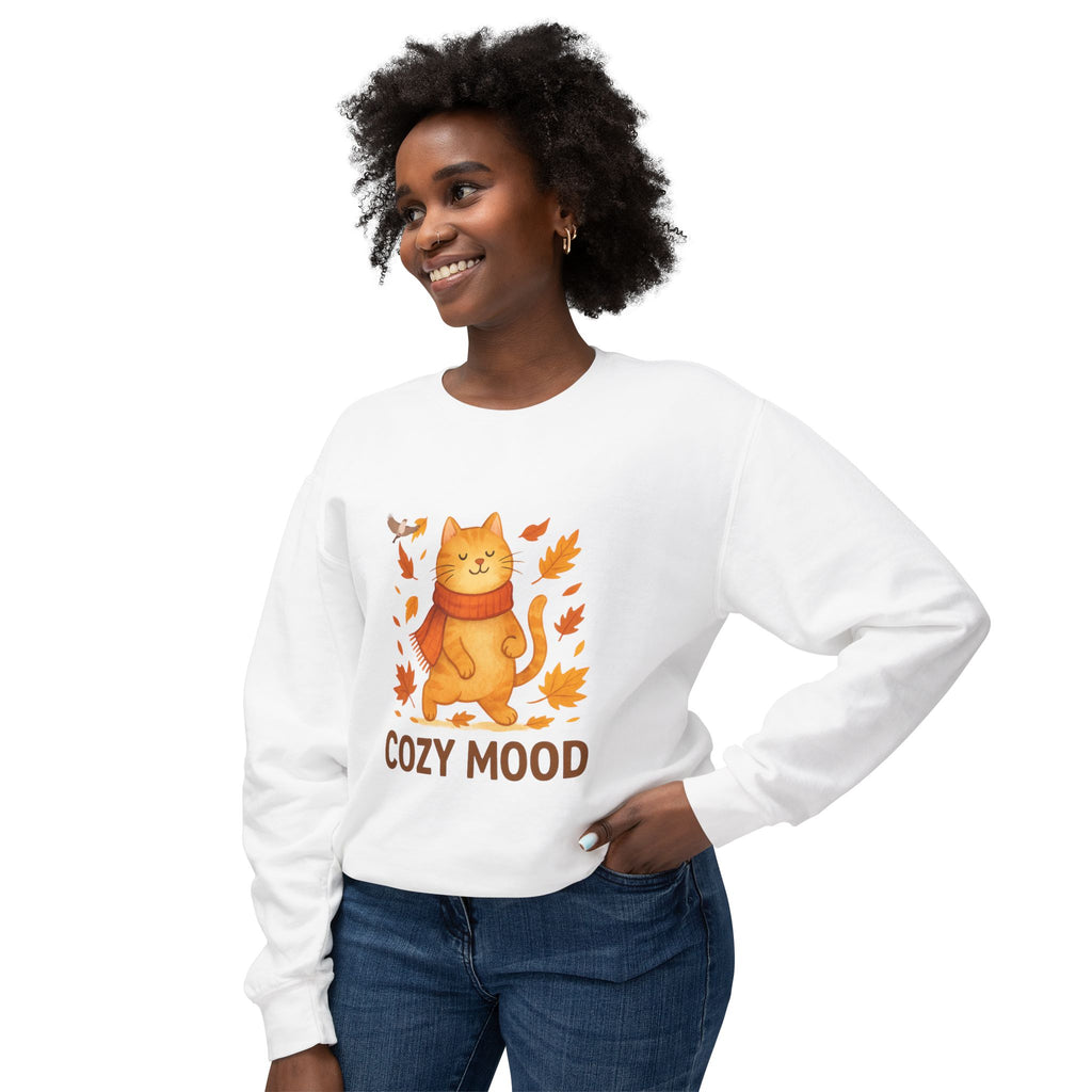 Woman wearing a white sweatshirt with a cat graphic and 'Cozy Mood' text on a white background