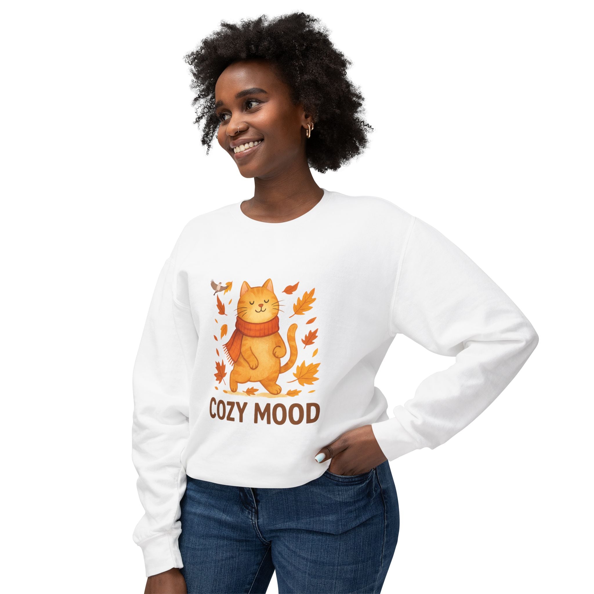 Woman wearing a white sweatshirt with a cat graphic and 'Cozy Mood' text on a white background