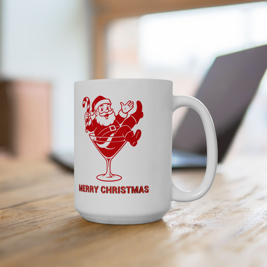 White mug with red Santa Claus design and 'Merry Christmas' text on a wooden surface.