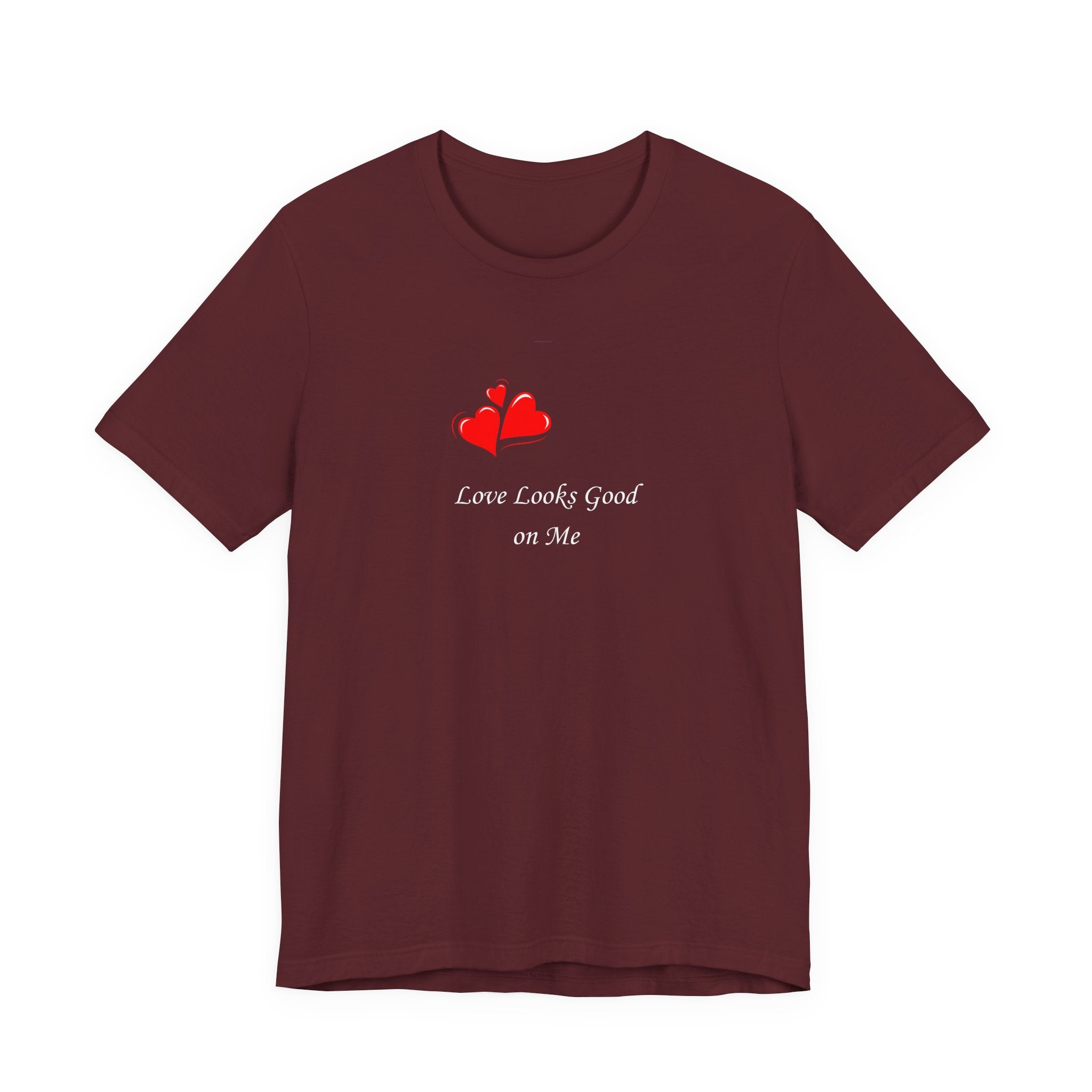 Maroon t-shirt with red heart design and text on a white background