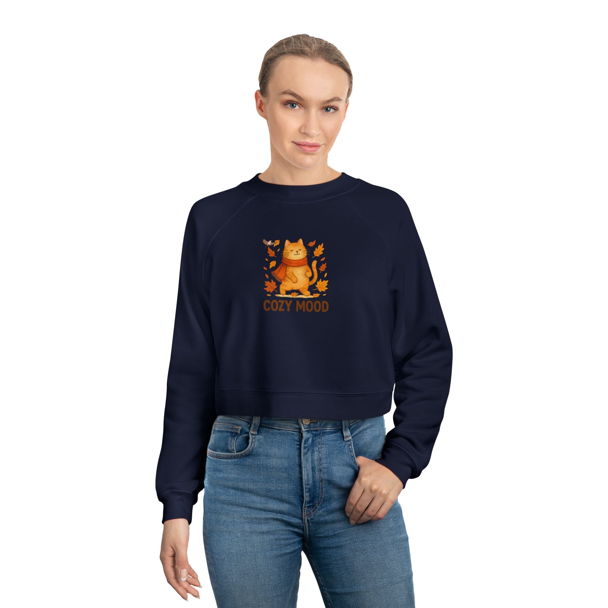 Person wearing a navy blue sweatshirt with a cat graphic and text on a white background