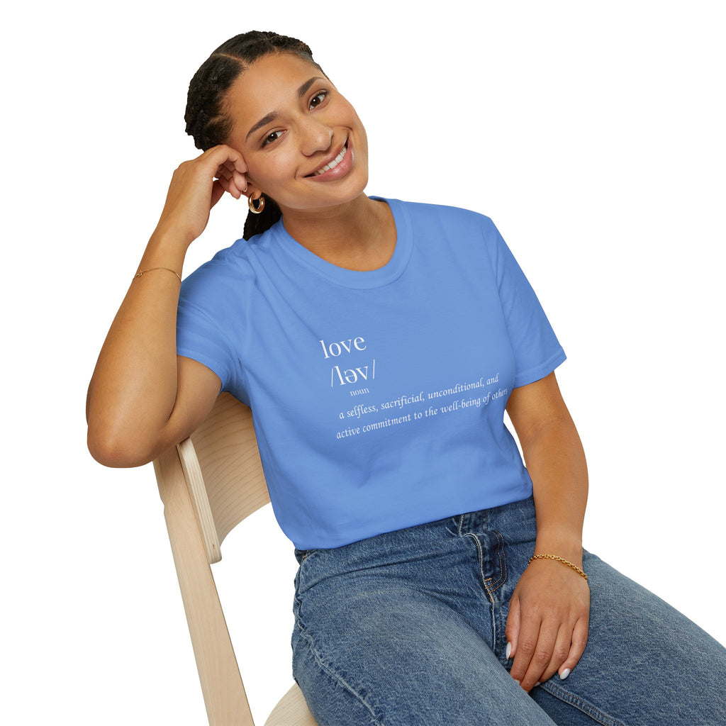 Woman wearing a blue t-shirt with text, sitting on a chair against a white background