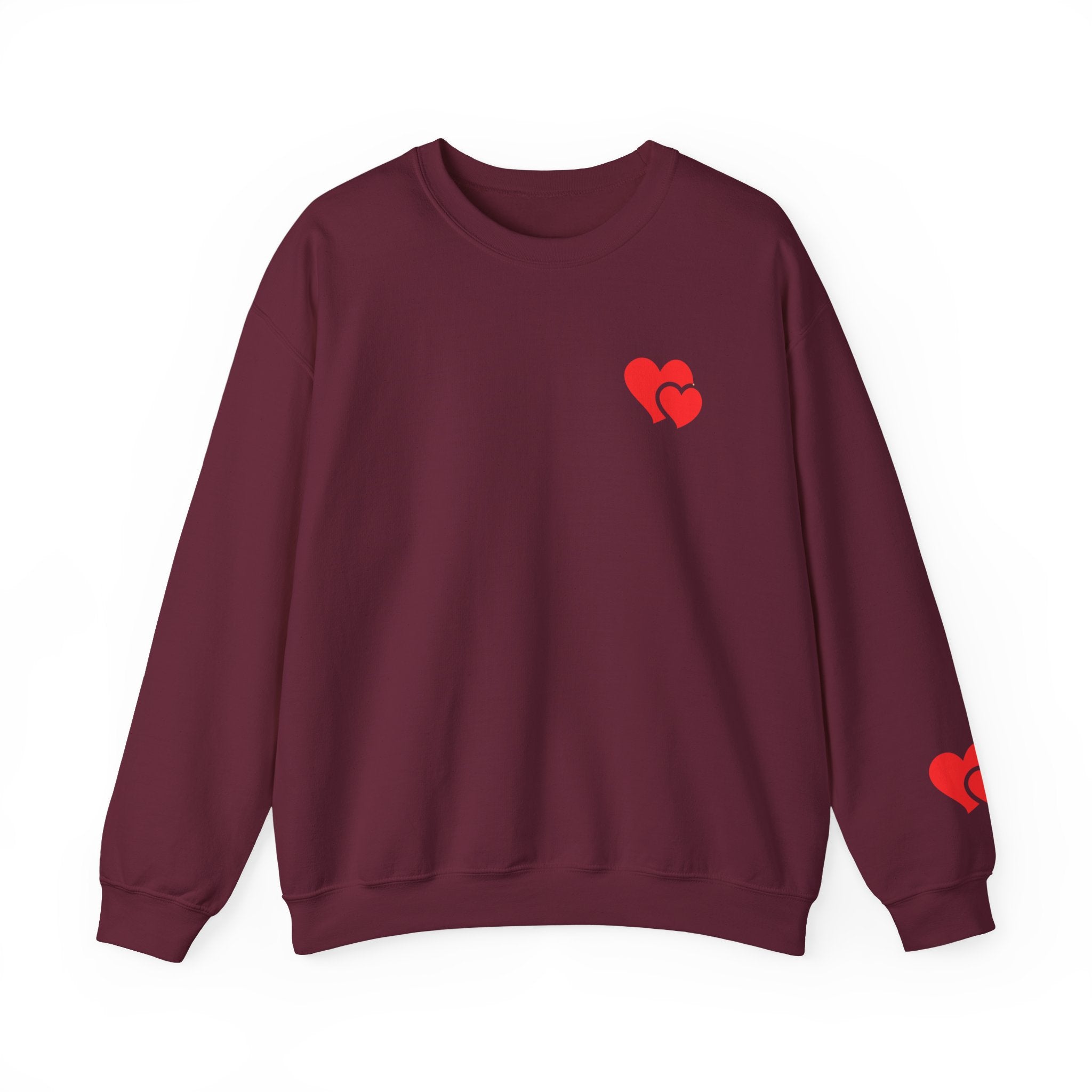 Maroon sweatshirt with red heart designs on a white background