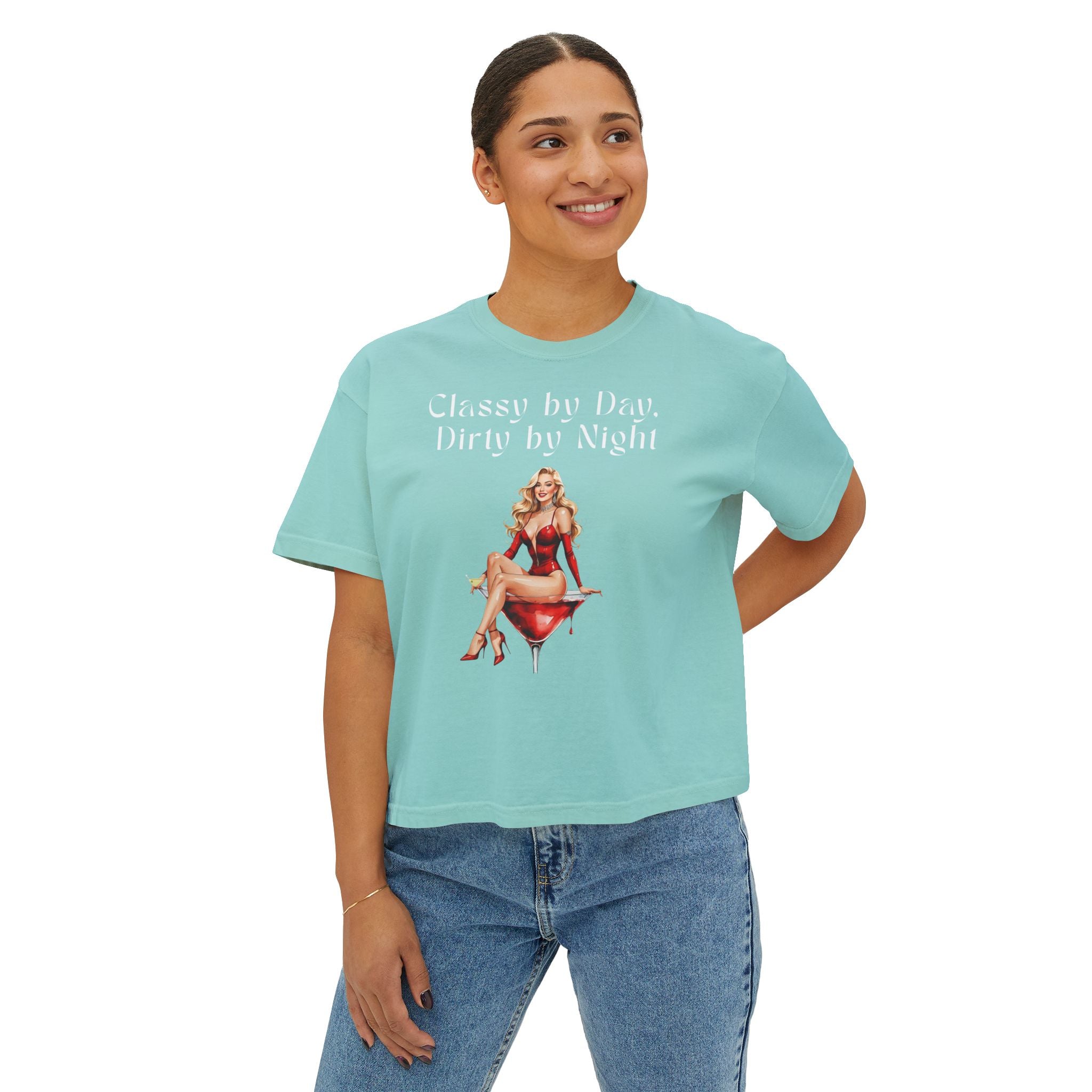 Person wearing a light blue t-shirt with a graphic design and text on a white background