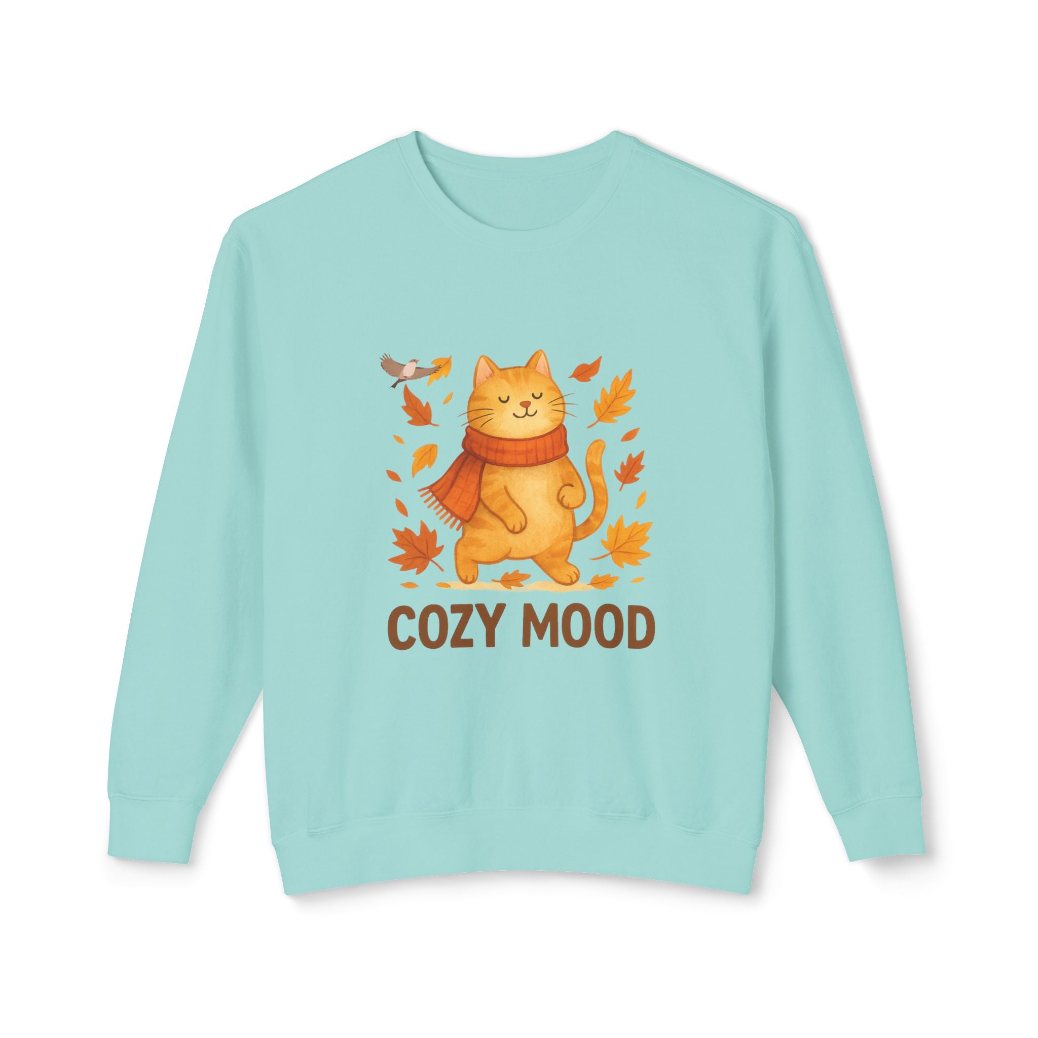 Light blue sweatshirt with a cat wearing a scarf and autumn leaves and the text 'Cozy Mood' on a white background.