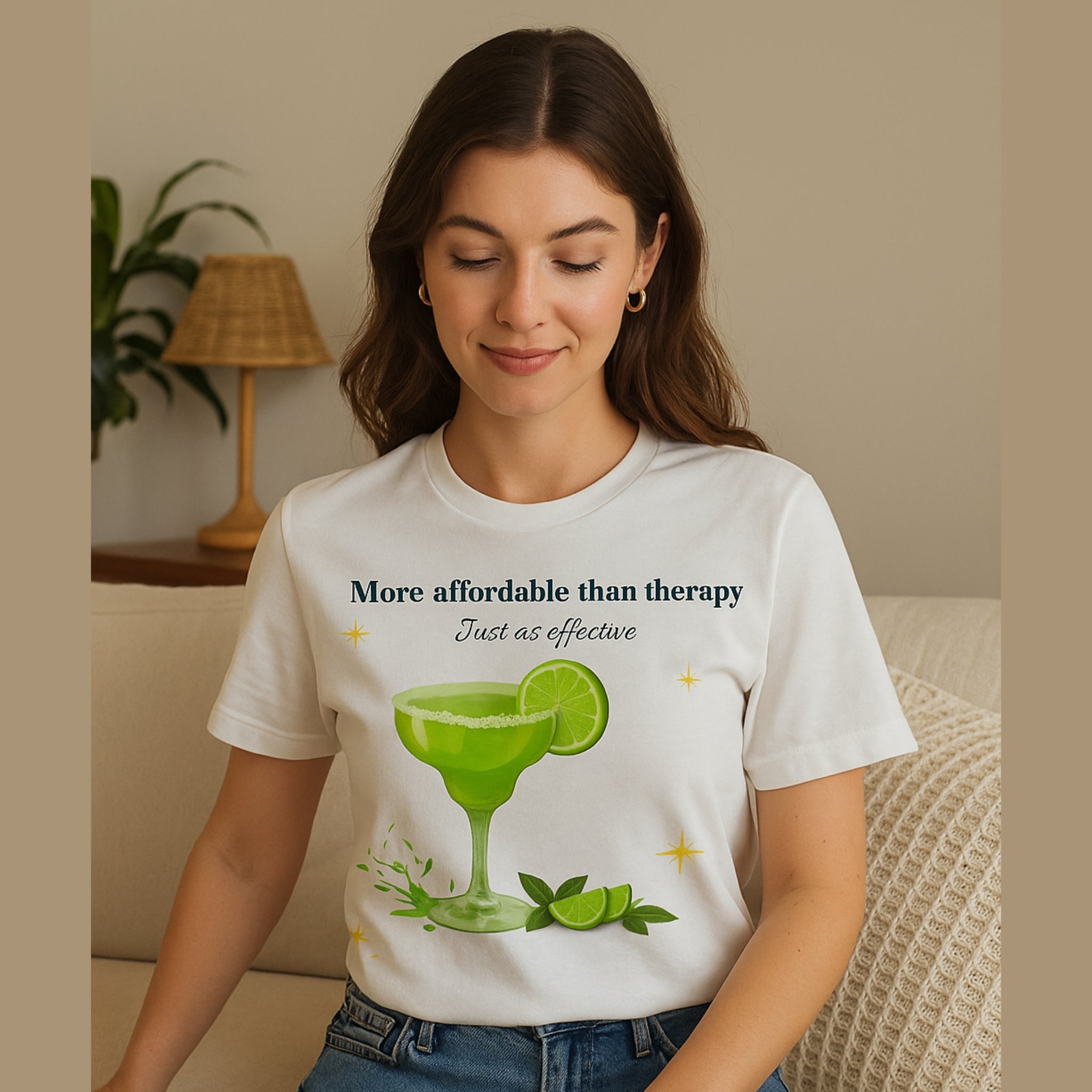 Woman wearing a white t-shirt with a green cocktail graphic and text.
