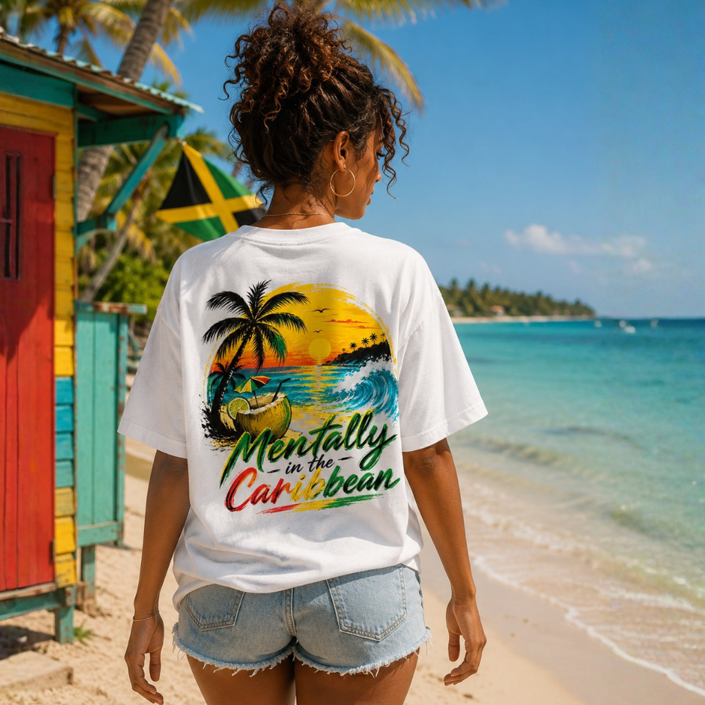 Person wearing a t-shirt with a Caribbean design on a beach